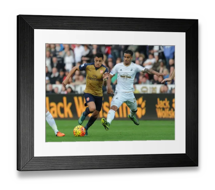 Framed Print : Alexis Sanchez Surges Past Kyle Naughton: Swansea City vs Arsenal (2015-16)
