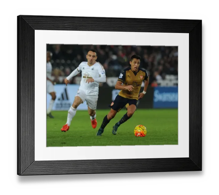 Framed Print : Alexis Sanchez Outmaneuvers Leon Britton: Arsenal's Masterclass in Swansea's Premier League Clash (October 2015)