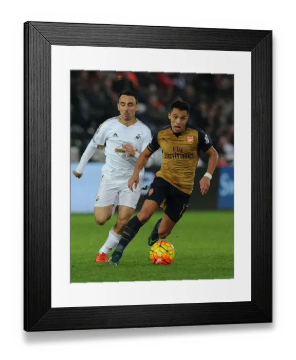 Framed Print : Alexis Sanchez Surges Past Leon Britton: Swansea City vs Arsenal, 2015-16 Premier League Framed Print : Alexis Sanchez Surges Past Leon Britton: Swansea City vs Arsenal, 2015-16 Premier League