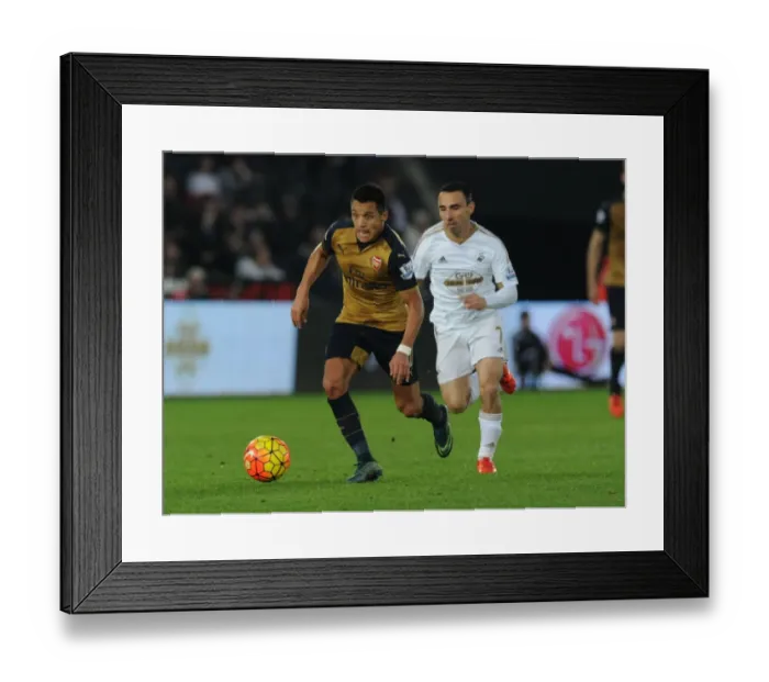 Framed Print : Alexis Sanchez's Masterclass: Outmaneuvering Leon Britton in Arsenal's Victory over Swansea, 2015-16 Premier League Framed Print : Alexis Sanchez's Masterclass: Outmaneuvering Leon Britton in Arsenal's Victory over Swansea, 2015-16 Premier League