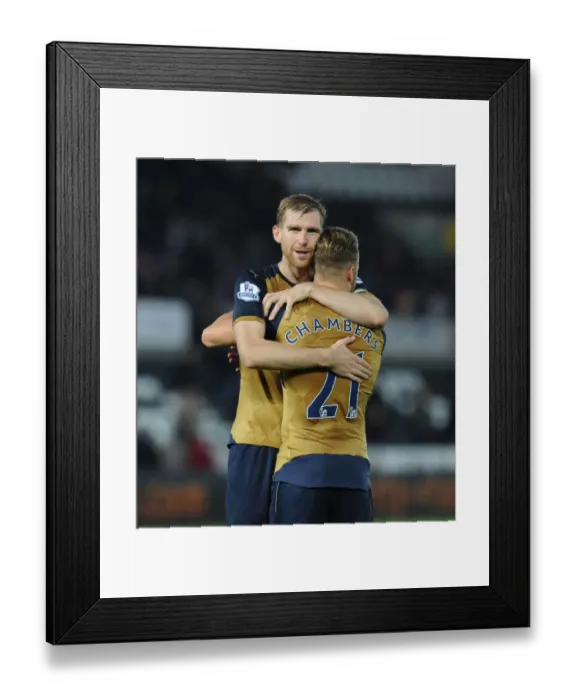 Framed Print : Arsenal's Mertesacker and Chambers: Victory Celebration vs Swansea City (2015-16)