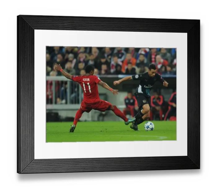 Framed Print : Coquelin vs Costa: A Footballing Battle in the Bayern Munich vs Arsenal UEFA Champions League Clash Framed Print : Coquelin vs Costa: A Footballing Battle in the Bayern Munich vs Arsenal UEFA Champions League Clash