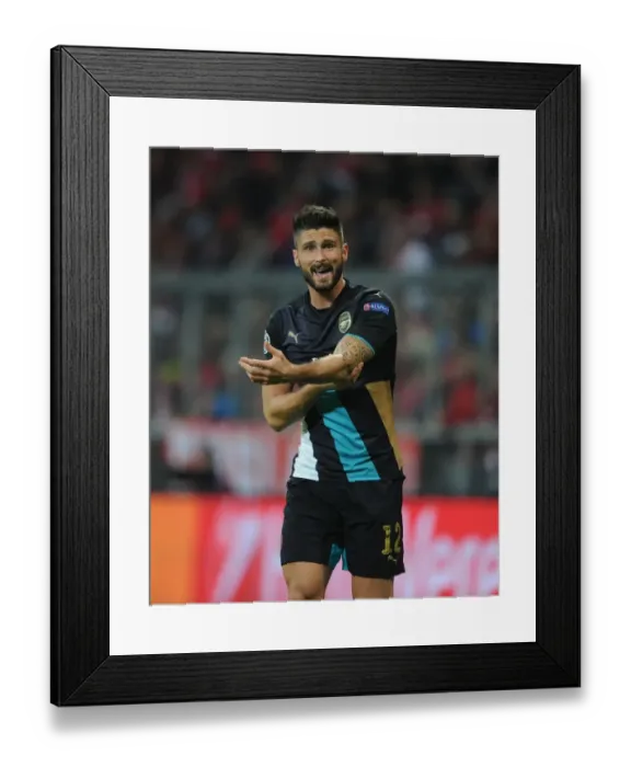Framed Print : Giroud's Battle in Munich: Arsenal vs Bayern Champions League Clash Framed Print : Giroud's Battle in Munich: Arsenal vs Bayern Champions League Clash