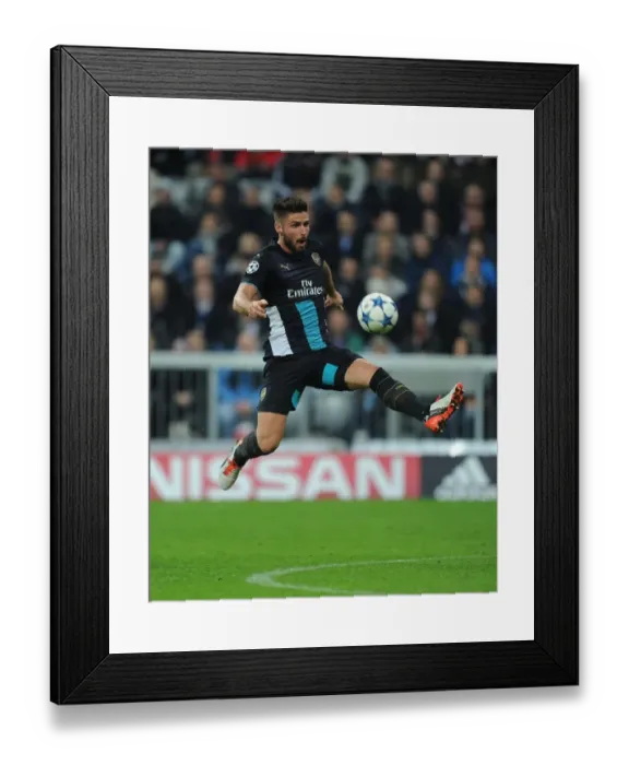 Framed Print : Olivier Giroud: Arsenal's Unyielding Striker in the Heart of the Bayern Munich Battle Framed Print : Olivier Giroud: Arsenal's Unyielding Striker in the Heart of the Bayern Munich Battle