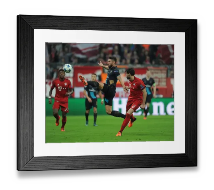 Framed Print : Clash of Titans: A Battle of Strength and Skill - Olivier Giroud vs. Javi Martinez, UEFA Champions League Showdown Framed Print : Clash of Titans: A Battle of Strength and Skill - Olivier Giroud vs. Javi Martinez, UEFA Champions League Showdown