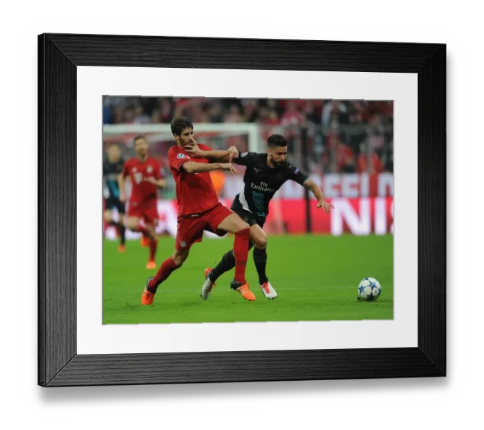 Framed Print : Clash of Titans: Olivier Giroud vs. Javi Martinez - A Champions League Showdown Framed Print : Clash of Titans: Olivier Giroud vs. Javi Martinez - A Champions League Showdown