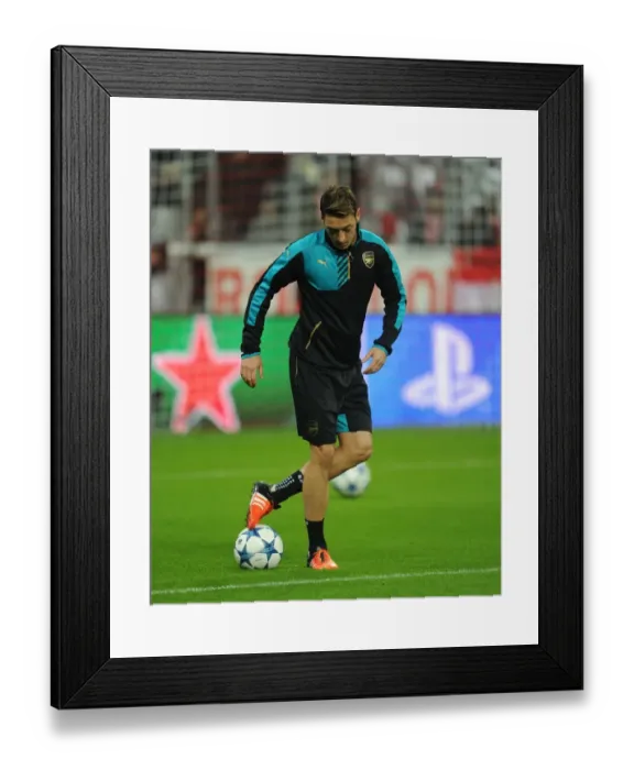 Framed Print : Mesut Ozil: Gearing Up for the Champions League Showdown - Bayern Munich vs Arsenal (2015)