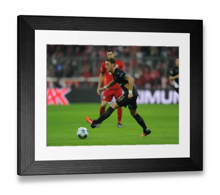 Framed Print : Clash at the Allianz Arena: Mesut Ozil Faces His Former Team - Bayern Munich vs Arsenal, UEFA Champions League (2015)