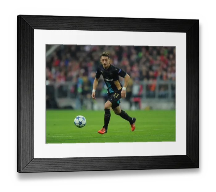 Framed Print : Clash at the Allianz Arena: Mesut Ozil Faces His Former Team - Bayern Munich vs Arsenal, UEFA Champions League (2015) Framed Print : Clash at the Allianz Arena: Mesut Ozil Faces His Former Team - Bayern Munich vs Arsenal, UEFA Champions League (2015)