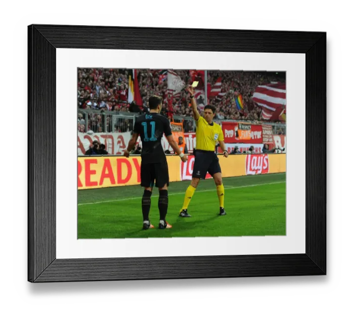 Framed Print : Mesut Ozil Yelled at by Referee in Bayern Munich vs Arsenal Champions League Match Framed Print : Mesut Ozil Yelled at by Referee in Bayern Munich vs Arsenal Champions League Match