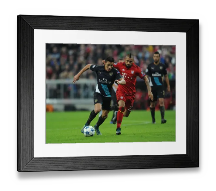 Framed Print : Clash of the Stars: Sanchez vs. Vidal - Arsenal vs. Bayern Munich, UEFA Champions League