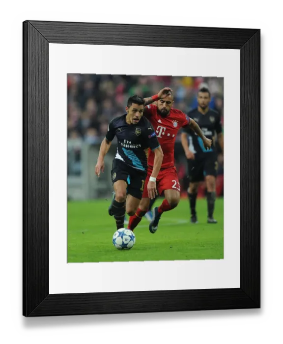 Framed Print : Clash of the Stars: Sanchez vs. Vidal - Bayern Munich vs. Arsenal UEFA Champions League Showdown Framed Print : Clash of the Stars: Sanchez vs. Vidal - Bayern Munich vs. Arsenal UEFA Champions League Showdown