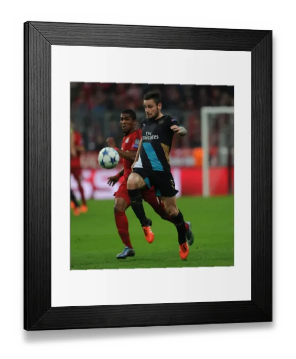 Framed Print : Champions Clash: Debuchy vs. Costa - Bayern Munich vs. Arsenal in the UEFA Champions League Framed Print : Champions Clash: Debuchy vs. Costa - Bayern Munich vs. Arsenal in the UEFA Champions League