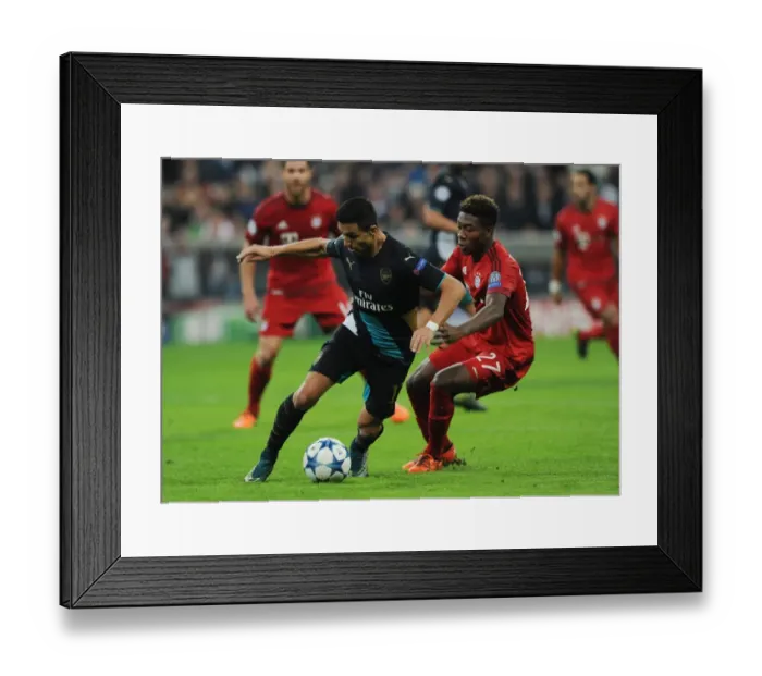 Framed Print : Clash of Titans: Sanchez vs. Coman - Bayern Munich vs. Arsenal, UEFA Champions League