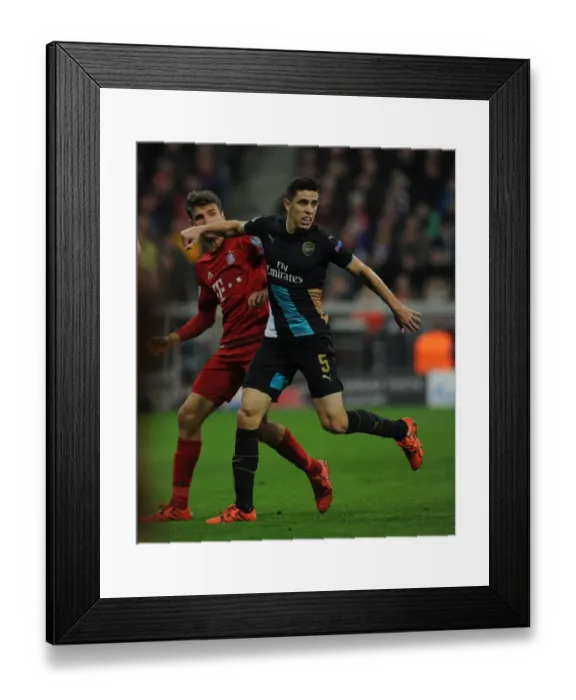 Framed Print : Gabriel vs Muller: A Champions League Showdown - Bayern Munich vs Arsenal