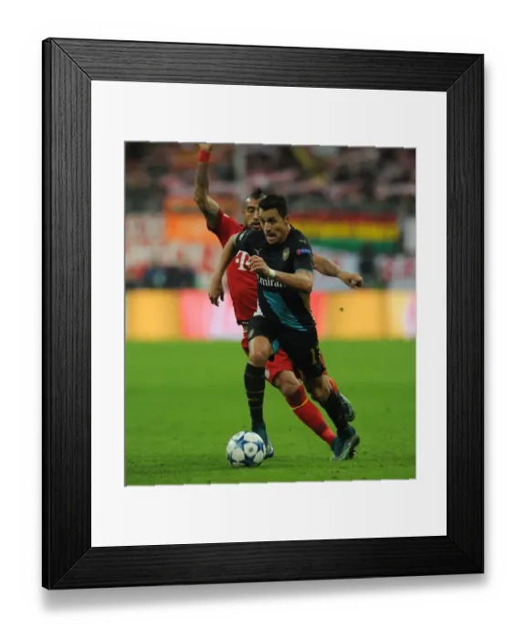 Framed Print : Clash of Titans: Bayern Munich vs. Arsenal - UEFA Champions League 2015-16: Alexis Sanchez vs. Arturo Vidal Battle at Allianz Arena