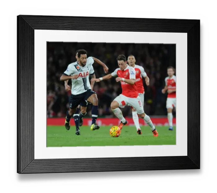 Framed Print : Ozil vs. Dembele: A Battle of Midfield Maestros in the Arsenal vs. Tottenham Rivalry (2015-16 Premier League) Framed Print : Ozil vs. Dembele: A Battle of Midfield Maestros in the Arsenal vs. Tottenham Rivalry (2015-16 Premier League)
