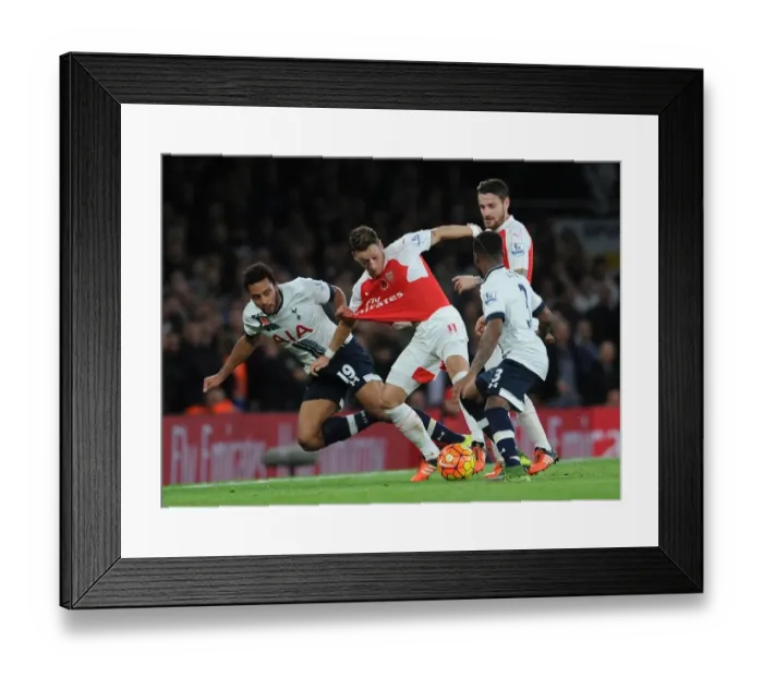Framed Print : Intense Rivalry: Ozil vs. Dembele Clash at the Emirates Framed Print : Intense Rivalry: Ozil vs. Dembele Clash at the Emirates