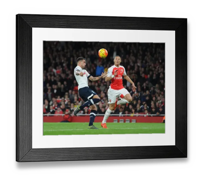 Framed Print : Kieran Gibbs Dramatic Last-Minute Goal: Arsenal Edge Past Tottenham in the 2015-16 Premier League