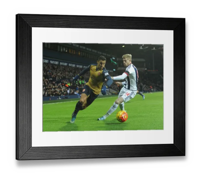 Framed Print : Arsenal's Alexis Sanchez vs. West Brom's James McClean: A Fierce Face-Off in the Premier League (November 2015) Framed Print : Arsenal's Alexis Sanchez vs. West Brom's James McClean: A Fierce Face-Off in the Premier League (November 2015)