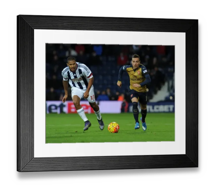 Framed Print : Santi Cazorla Outsmarts Salomon Rondon: A Premier League Showdown Between Arsenal and West Bromwich Albion