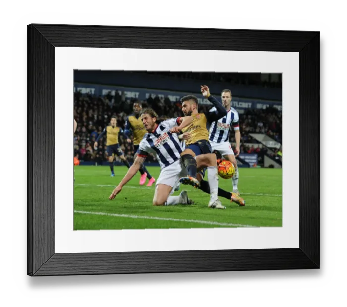 Framed Print : Giroud vs Evans: A Premier League Tackle Battle at The Hawthorns Framed Print : Giroud vs Evans: A Premier League Tackle Battle at The Hawthorns