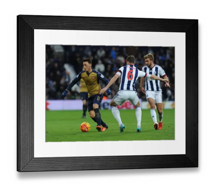 Framed Print : Mesut Ozil vs Jonny Evans: A Footballing Showdown at The Hawthorns (2015-16) Framed Print : Mesut Ozil vs Jonny Evans: A Footballing Showdown at The Hawthorns (2015-16)