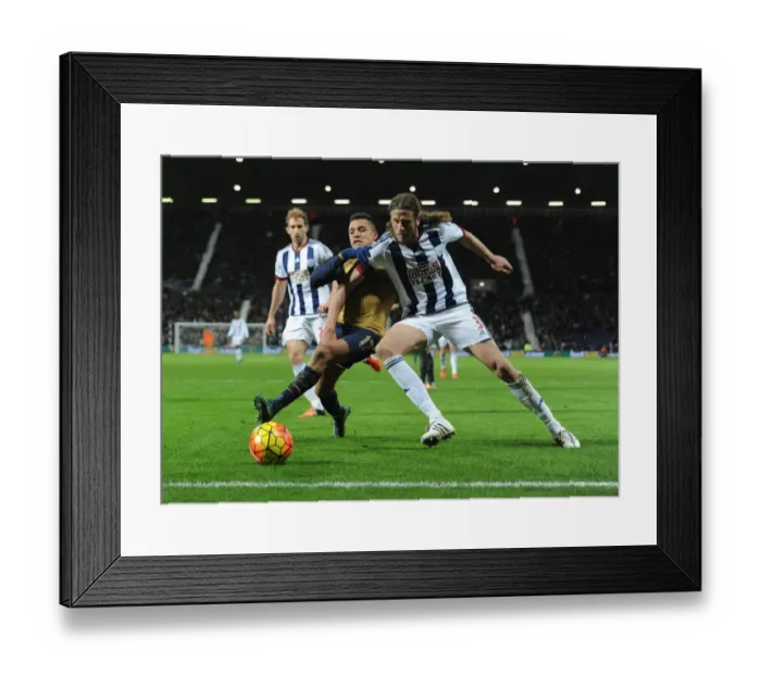 Framed Print : Arsenal's Alexis Sanchez vs. West Brom's Jonas Olsson: A Battle at The Hawthorns Framed Print : Arsenal's Alexis Sanchez vs. West Brom's Jonas Olsson: A Battle at The Hawthorns