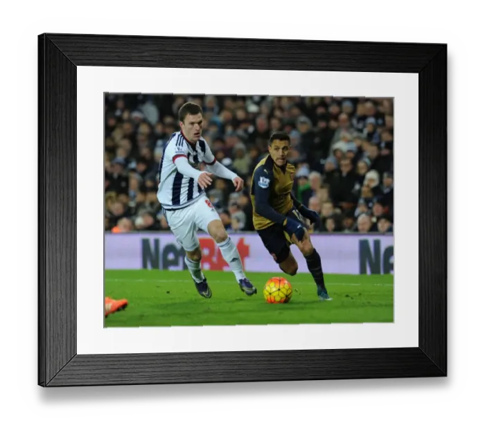 Framed Print : Alexis Sanchez's Thrilling Dash Past Craig Gardner: A Standout Moment from Arsenal's Victory over West Bromwich Albion (2015-16) Framed Print : Alexis Sanchez's Thrilling Dash Past Craig Gardner: A Standout Moment from Arsenal's Victory over West Bromwich Albion (2015-16)