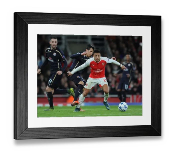 Framed Print : Arsenal's Alexis Sanchez vs. Dinamo Zagreb's Leonardo Sigali: A Battle in the 2015-16 UEFA Champions League Framed Print : Arsenal's Alexis Sanchez vs. Dinamo Zagreb's Leonardo Sigali: A Battle in the 2015-16 UEFA Champions League