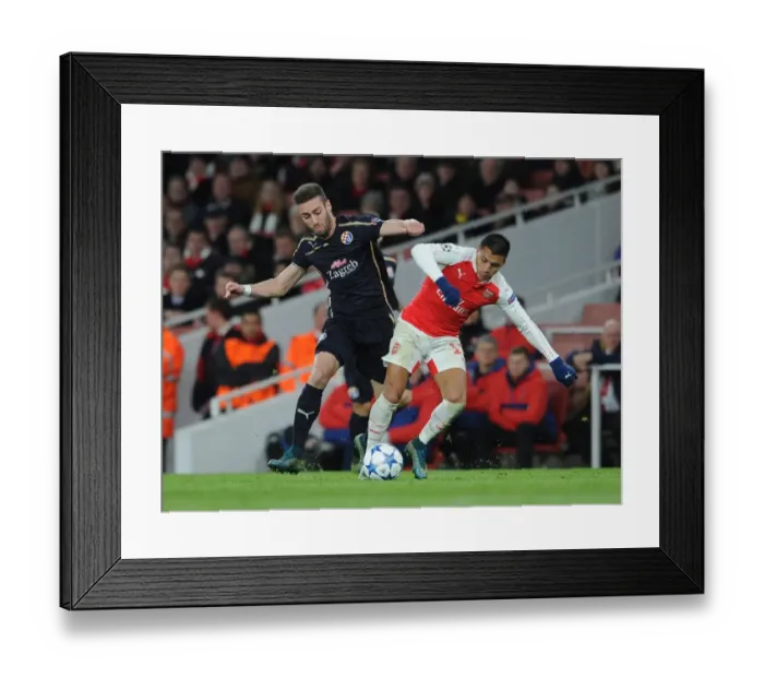 Framed Print : Champions League Showdown: Sanchez vs. Pinto - Arsenal vs. Dinamo Zagreb