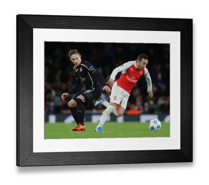 Framed Print : Arsenal's Santi Cazorla Outshines Marko Rog: A Dazzling Moment from the 2015-16 Champions League Clash