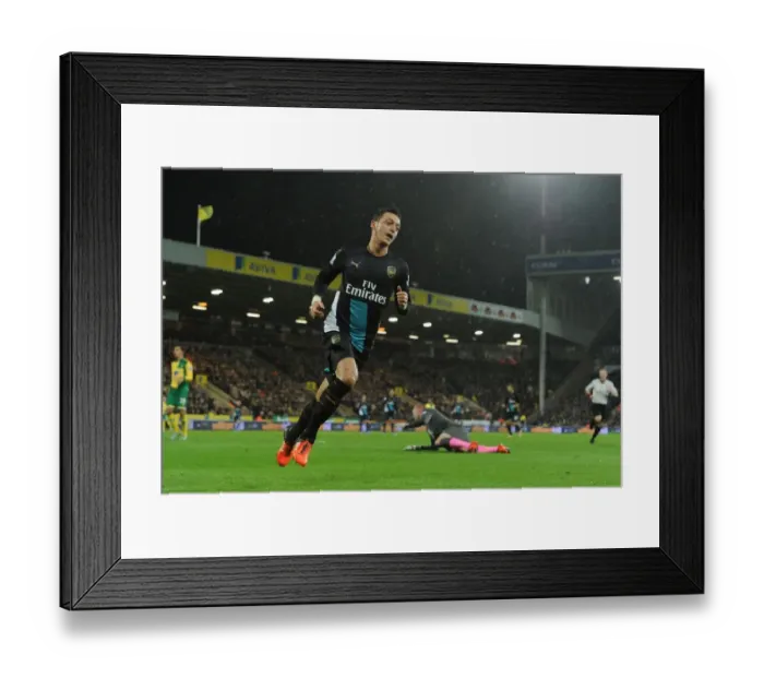 Framed Print : Mesut Ozil Scores: Arsenal Triumphs Over Norwich City in Premier League 2015-16 Framed Print : Mesut Ozil Scores: Arsenal Triumphs Over Norwich City in Premier League 2015-16