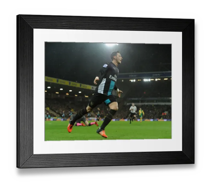 Framed Print : Mesut Ozil Scores: Arsenal's Triumph over Norwich City in Premier League 2015-16