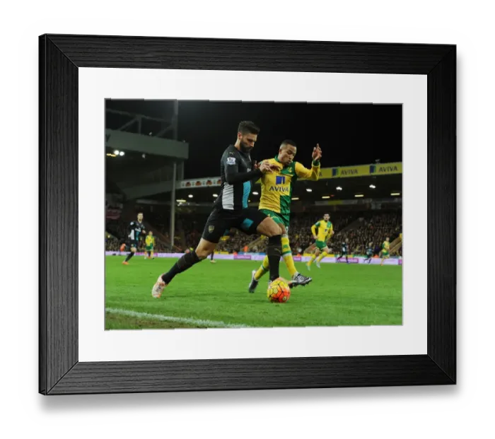 Framed Print : Giroud vs Olsson: A Premier League Showdown at Carrow Road, Norwich City vs Arsenal (2015-16) Framed Print : Giroud vs Olsson: A Premier League Showdown at Carrow Road, Norwich City vs Arsenal (2015-16)