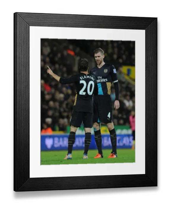Framed Print : Arsenal's Flamini and Mertesacker in Deep Concentration during Norwich Clash (2015-16)