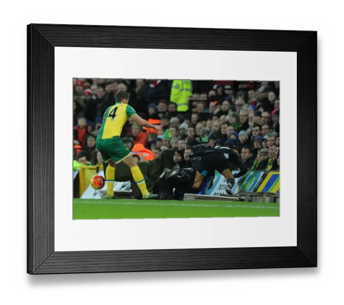 Framed Print : Sanchez vs. Bennett: Intense Clash at Carrow Road