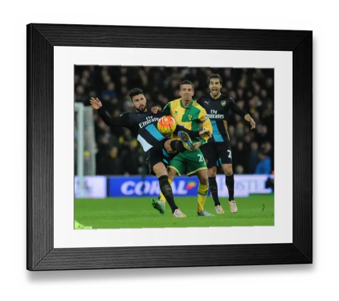 Framed Print : Giroud vs. O'Neil: A Premier League Showdown at Carrow Road