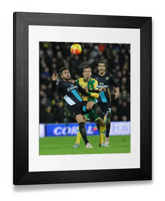Framed Print : Giroud vs. O'Neil: A Premier League Battle at Carrow Road