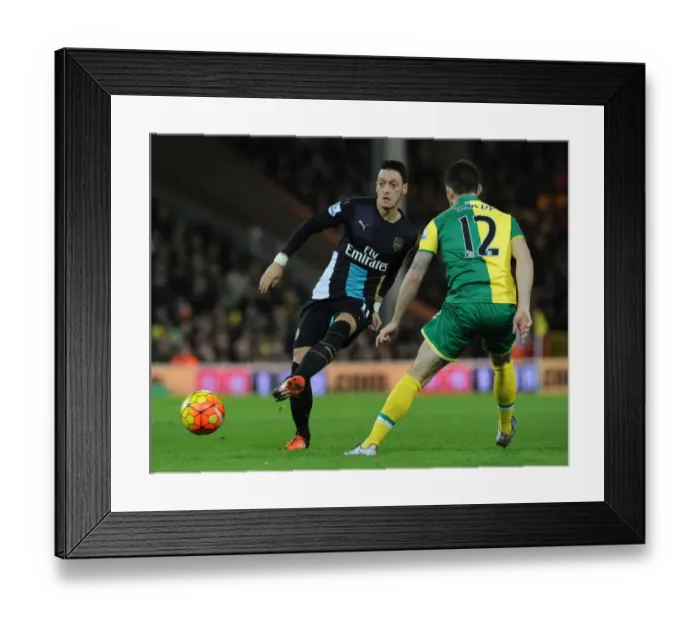 Framed Print : Intense Clash: Mesut Ozil vs. Robbie Brady - Norwich City vs. Arsenal (Premier League 2015-16)