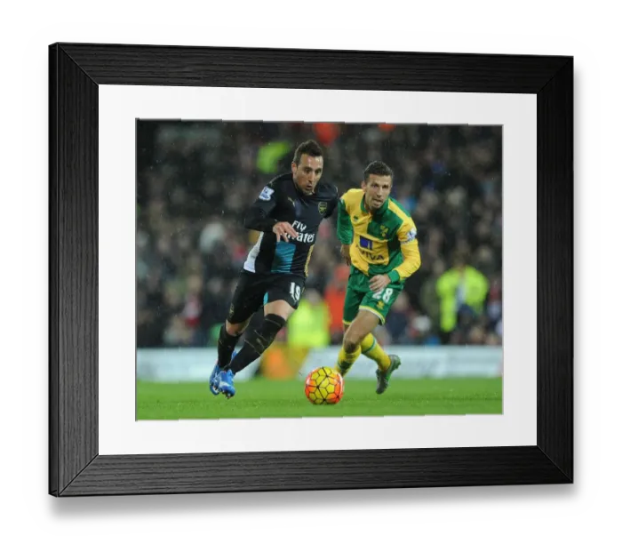 Framed Print : Santi Cazorla Dances Past Gary O'Neil: A Moment of Magic from the 2015-16 Arsenal vs. Norwich City Premier League Match