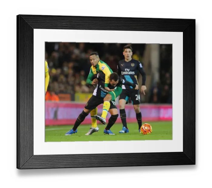 Framed Print : Clash at Carrow Road: Cazorla vs. Olsson - Premier League Battle