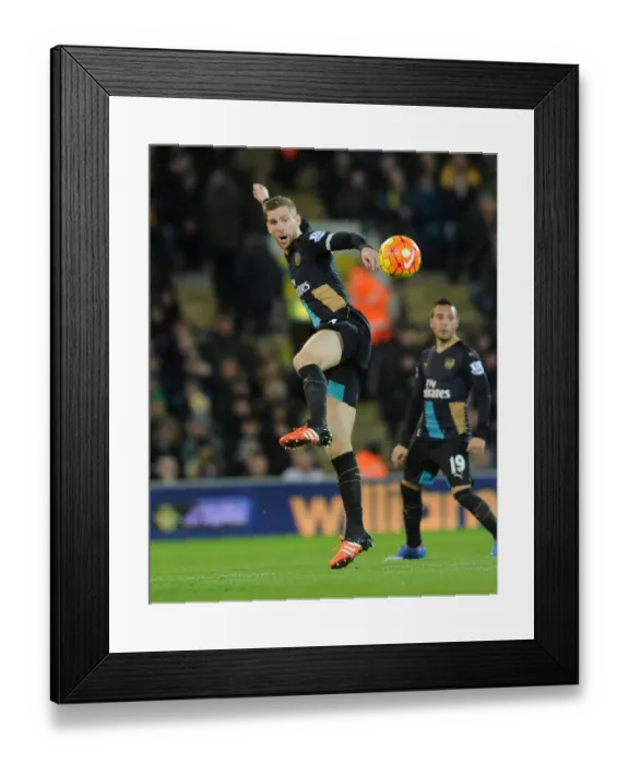 Framed Print : Per Mertesacker's Intense Focus: Norwich City vs Arsenal, 2015-16 Premier League