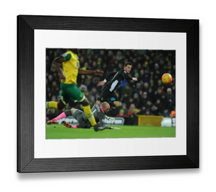 Framed Print : Mesut Ozil's Stunning Goal vs. Norwich City: Arsenal's Star Midfielder Scores Past John Ruddy, 2015-16 Premier League