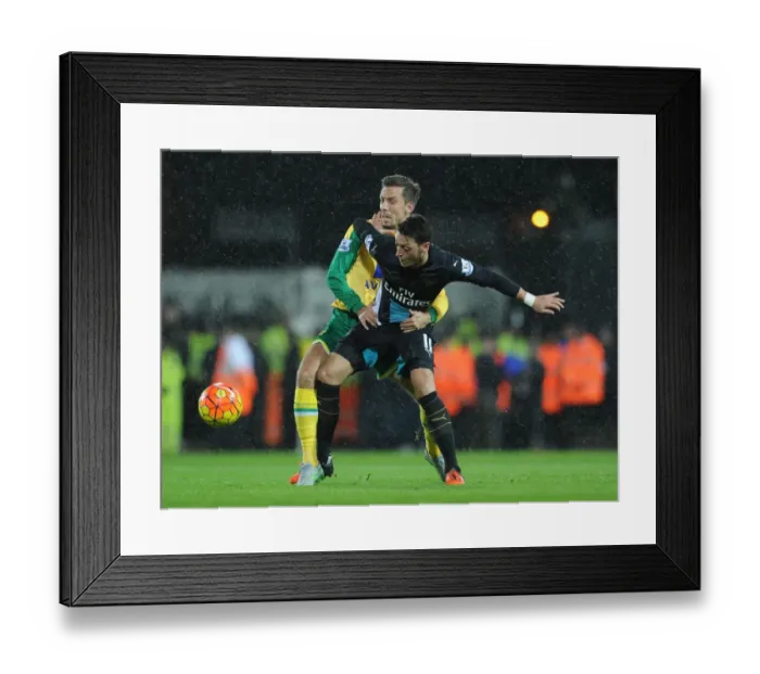 Framed Print : Mesut Ozil vs. Gary O'Neil: A Football Rivalry Unfolds at Carrow Road Framed Print : Mesut Ozil vs. Gary O'Neil: A Football Rivalry Unfolds at Carrow Road