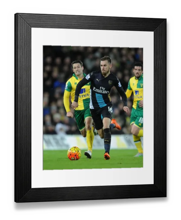 Framed Print : Clash of Midfield Maestros: Ramsey vs. Hoolahan, Arsenal vs. Norwich City, Premier League 2015-16 Framed Print : Clash of Midfield Maestros: Ramsey vs. Hoolahan, Arsenal vs. Norwich City, Premier League 2015-16