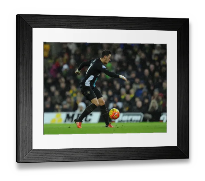 Framed Print : Mesut Ozil scores Arsenals goal. Norwich City 1: 1 Arsenal. Barclays Premier League