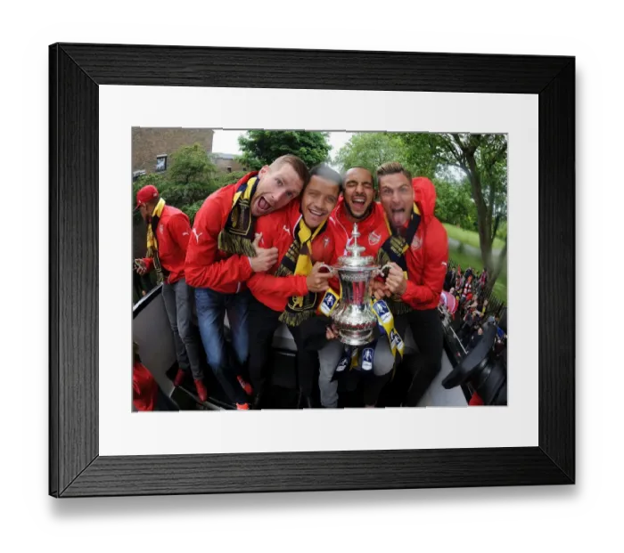 Framed Print : Arsenal FC's Unforgettable FA Cup Victory: Mertesacker, Sanchez, Walcott, and Giroud Celebrate Together (2014-15)