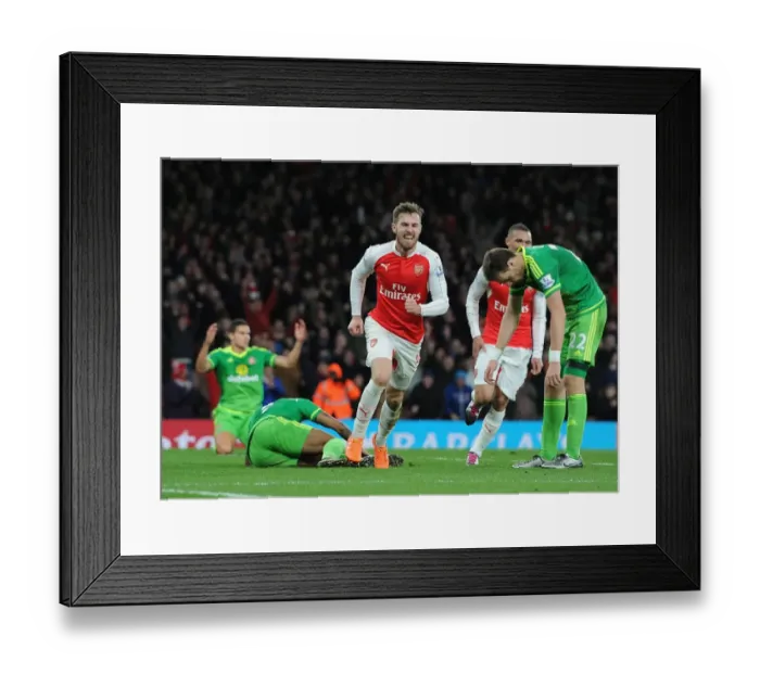 Framed Print : Ramsey's Hat-Trick: Arsenal Dominates Sunderland in Premier League Battle