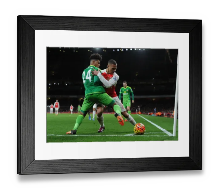 Framed Print : Arsenal's Kieran Gibbs Fends Off Sunderland's DeAndre Yedlin in Intense Premier League Battle